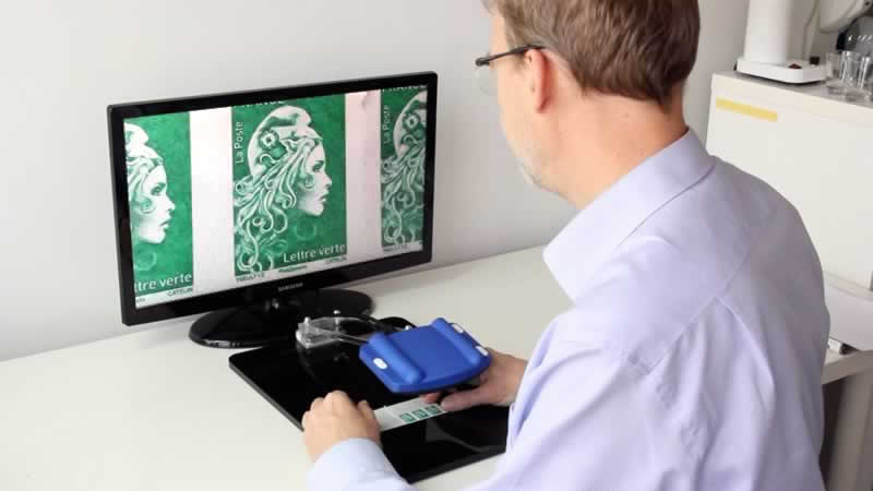 Froggyloupe para observação de selos postais